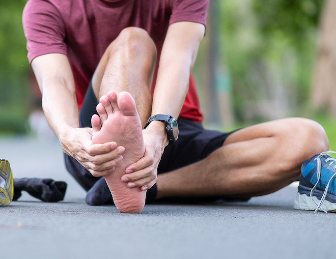 man having plantar fasciitis after walking